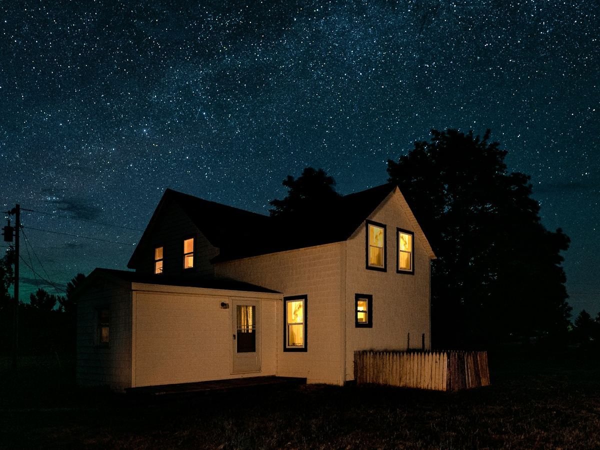 House with lights on at night