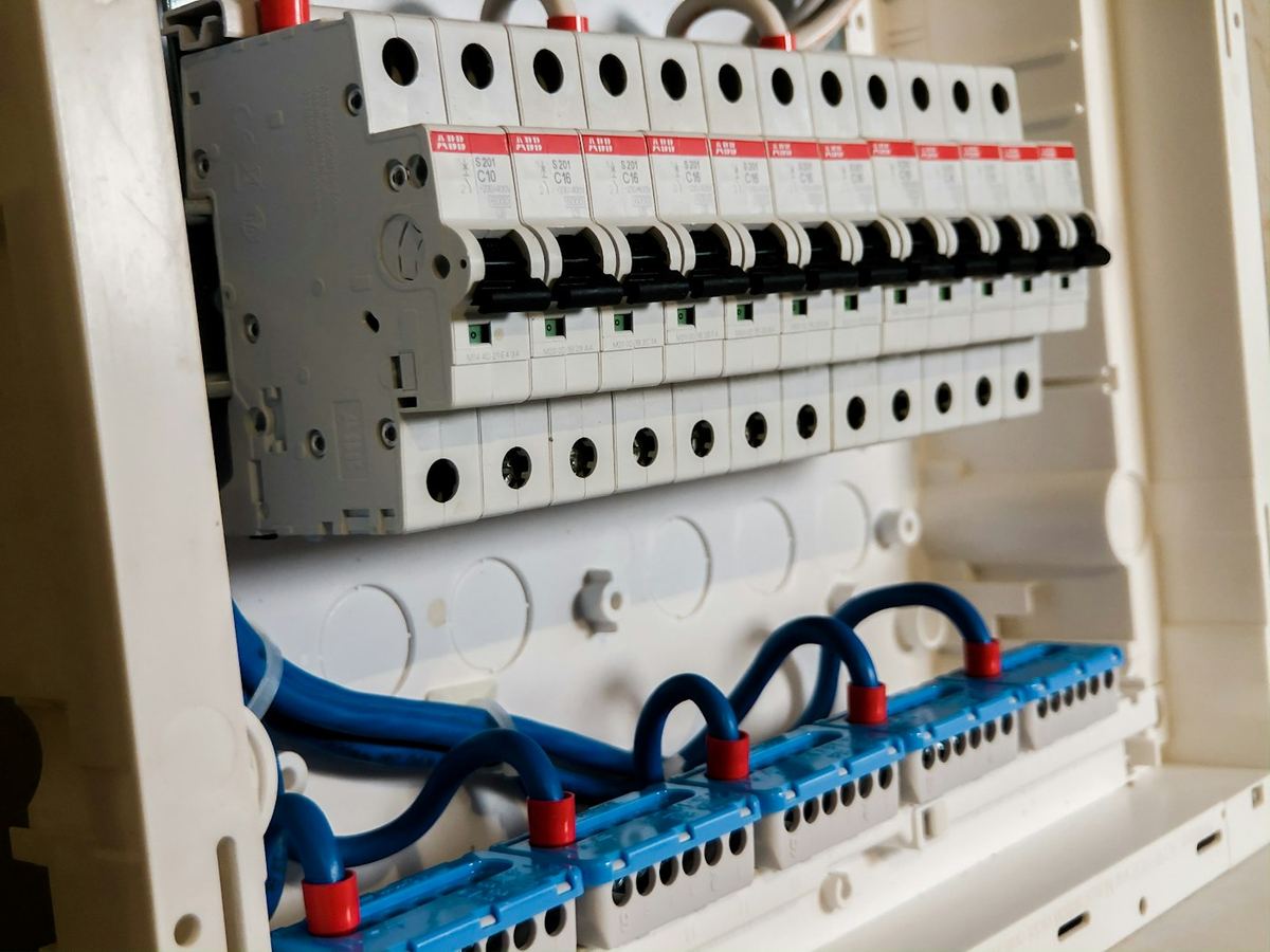 Clean, modern switchboard with new circuit breakers and safety switches